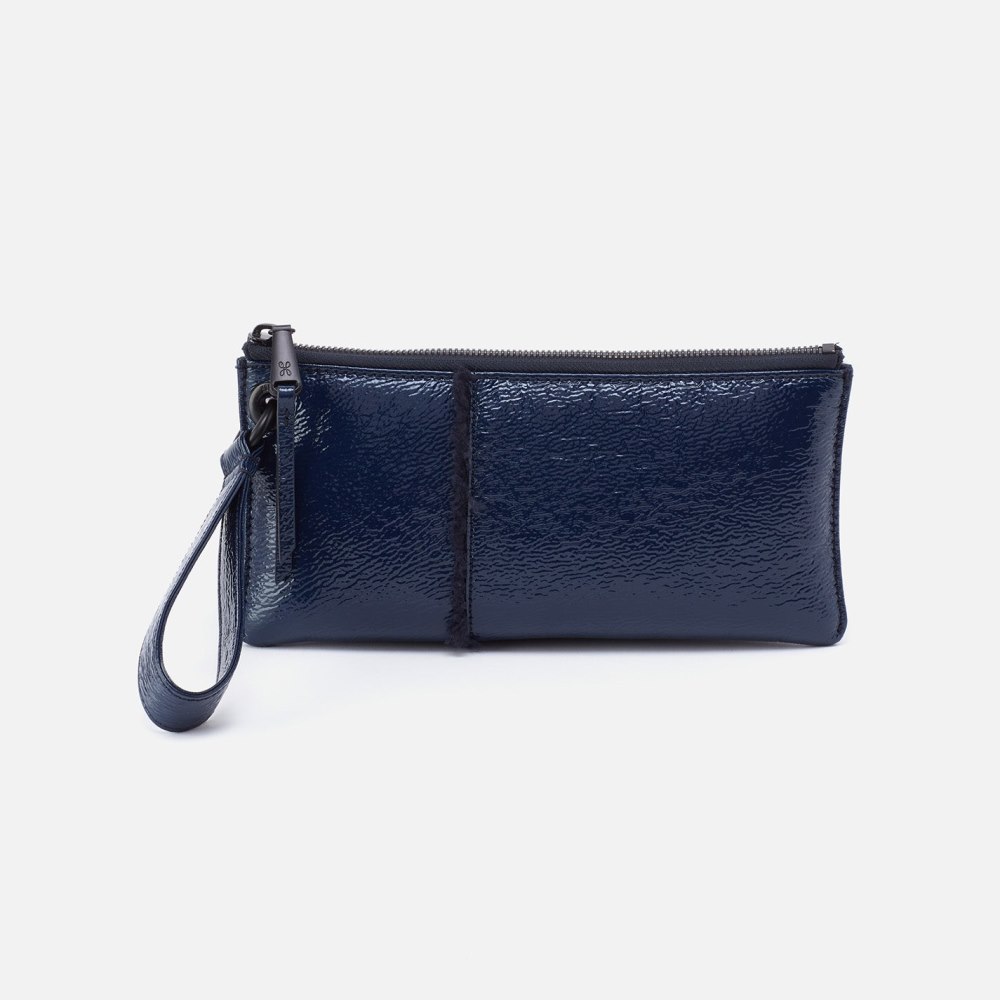 Hobo | Vida Wristlet in Pebbled Patent With Faux Shearling - Deep Indigo