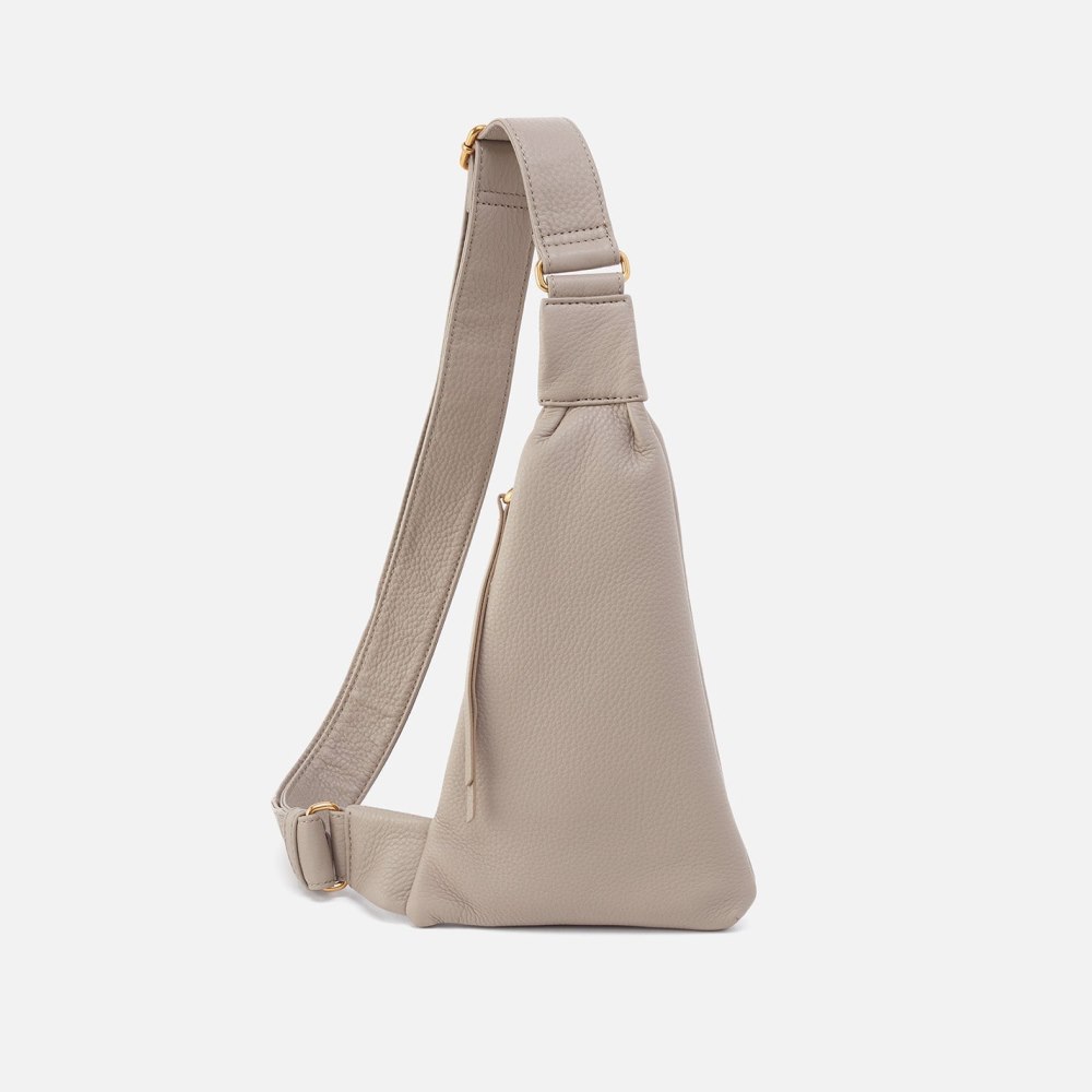 Hobo | Bodhi Sling in Pebbled Leather - Taupe