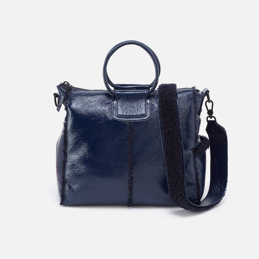 Hobo | Sheila Large Satchel in Pebbled Patent With Faux Shearling - Deep Indigo